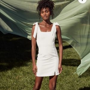 Your sweetie white tie mini dress Lulus. White lulus dress